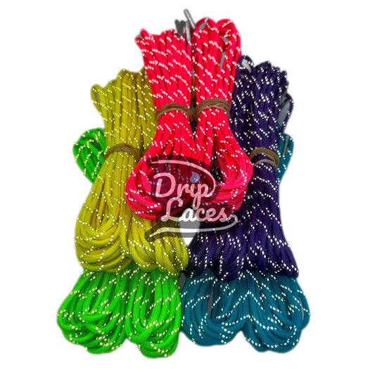 Colorful shoelaces with 'Drip Laces' branding on a white background
