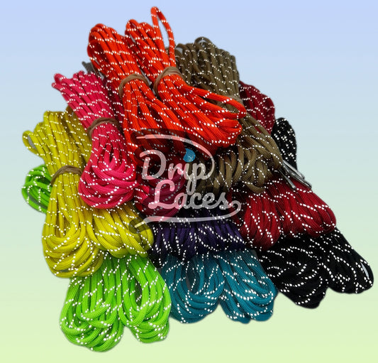 Colorful shoelaces in a bouquet arrangement with 'Drip Laces' branding on a gradient background.