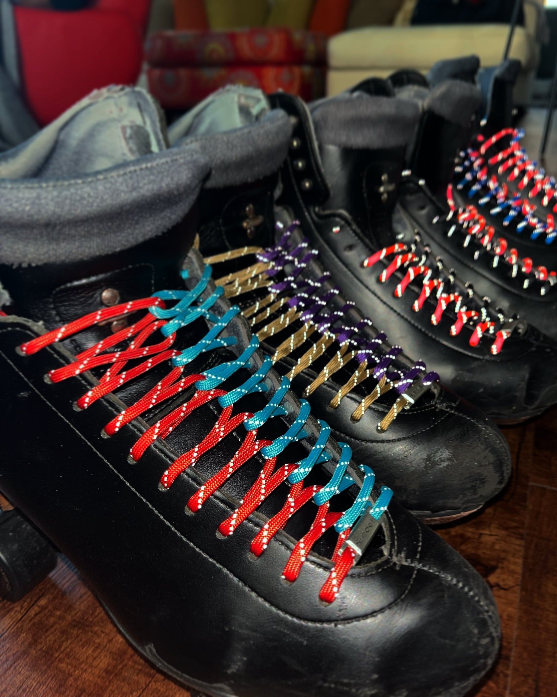 Black Skates with Colorful Two Tone Paracord Roller Skate Laces by DRIP LACES